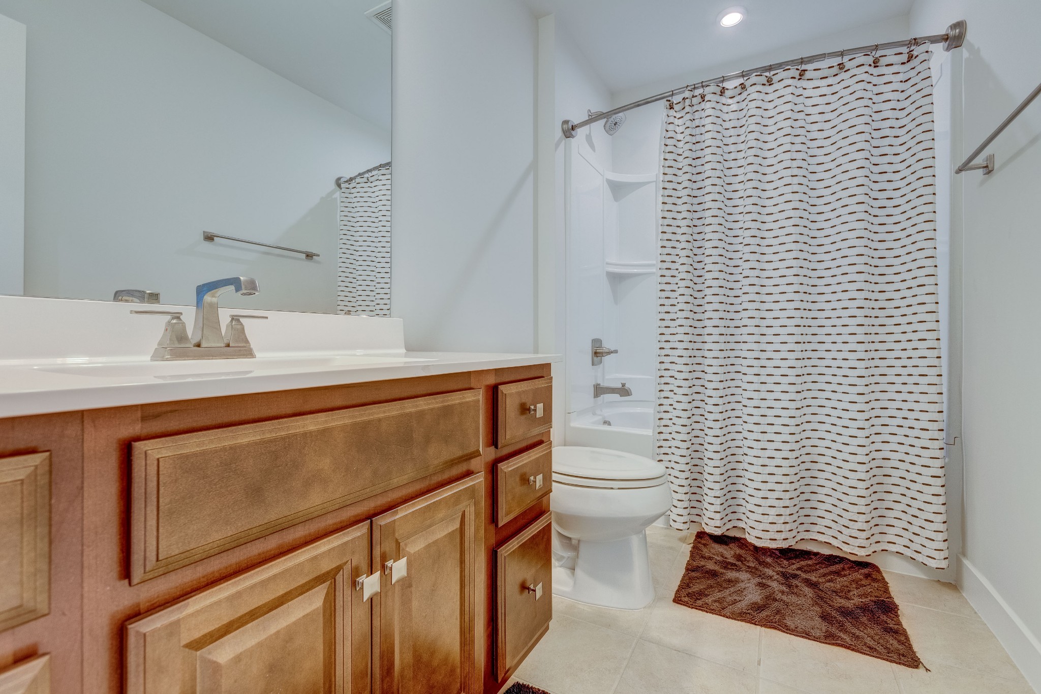 315 Collier Road Mount Juliet, TN 37122 - Photo 24 of 34 a bathroom with a sink a toilet and mirror