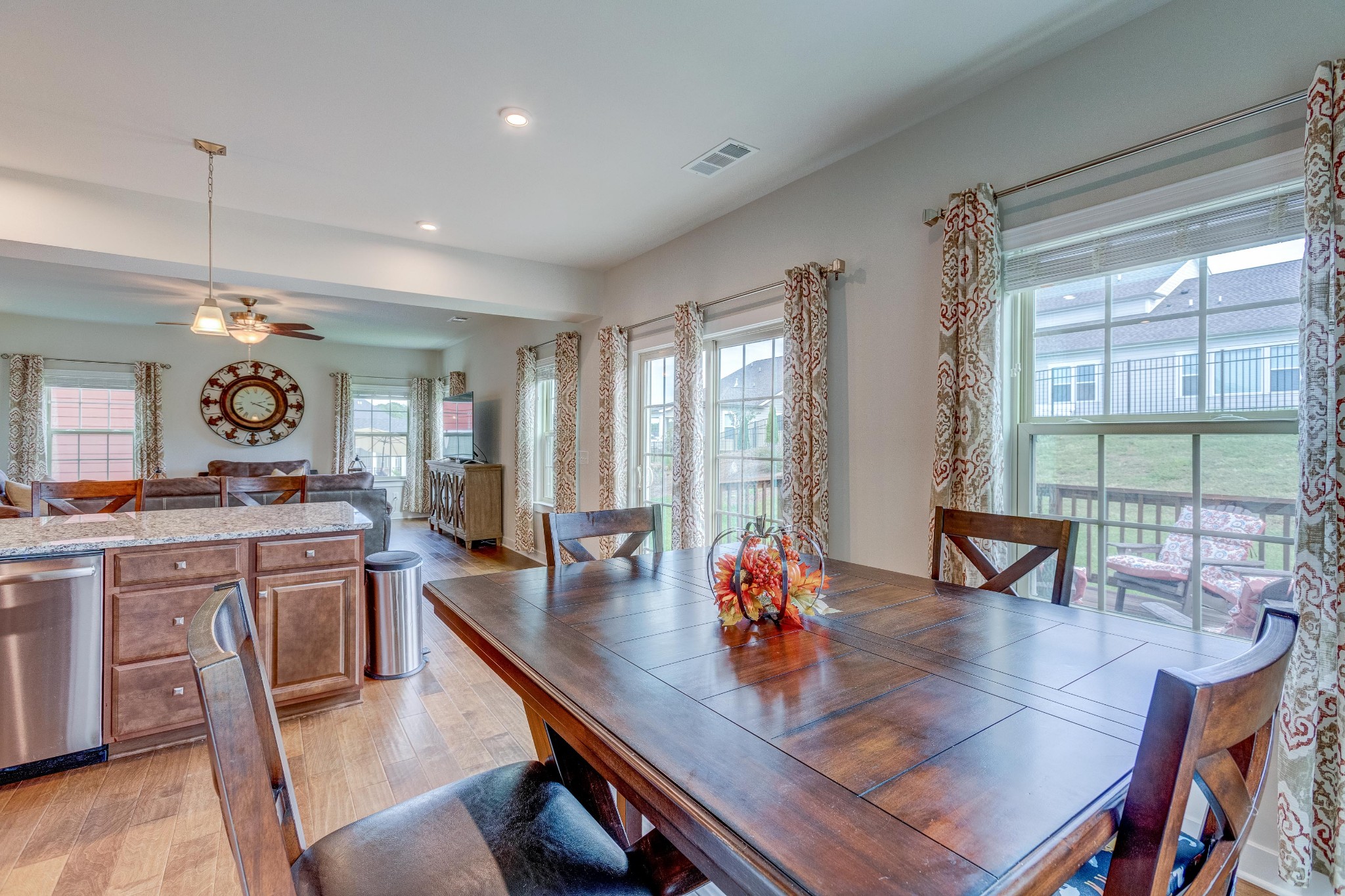 315 Collier Road Mount Juliet, TN 37122 - Photo 5 of 34 a view of a dining room with furniture and wooden floor