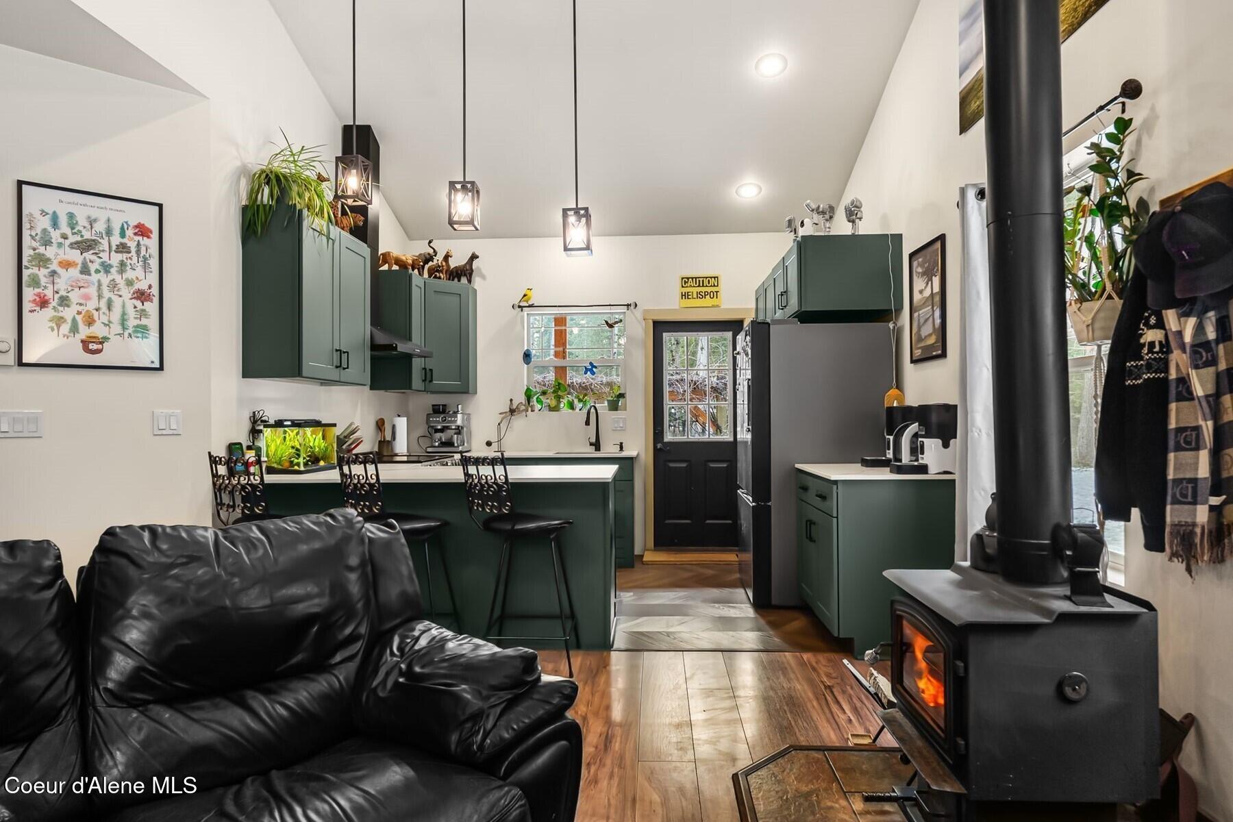 870 Samuels Road Sandpoint, ID 83864 - Photo 14 of 66 Toasty Woodstove Keeps it Warm