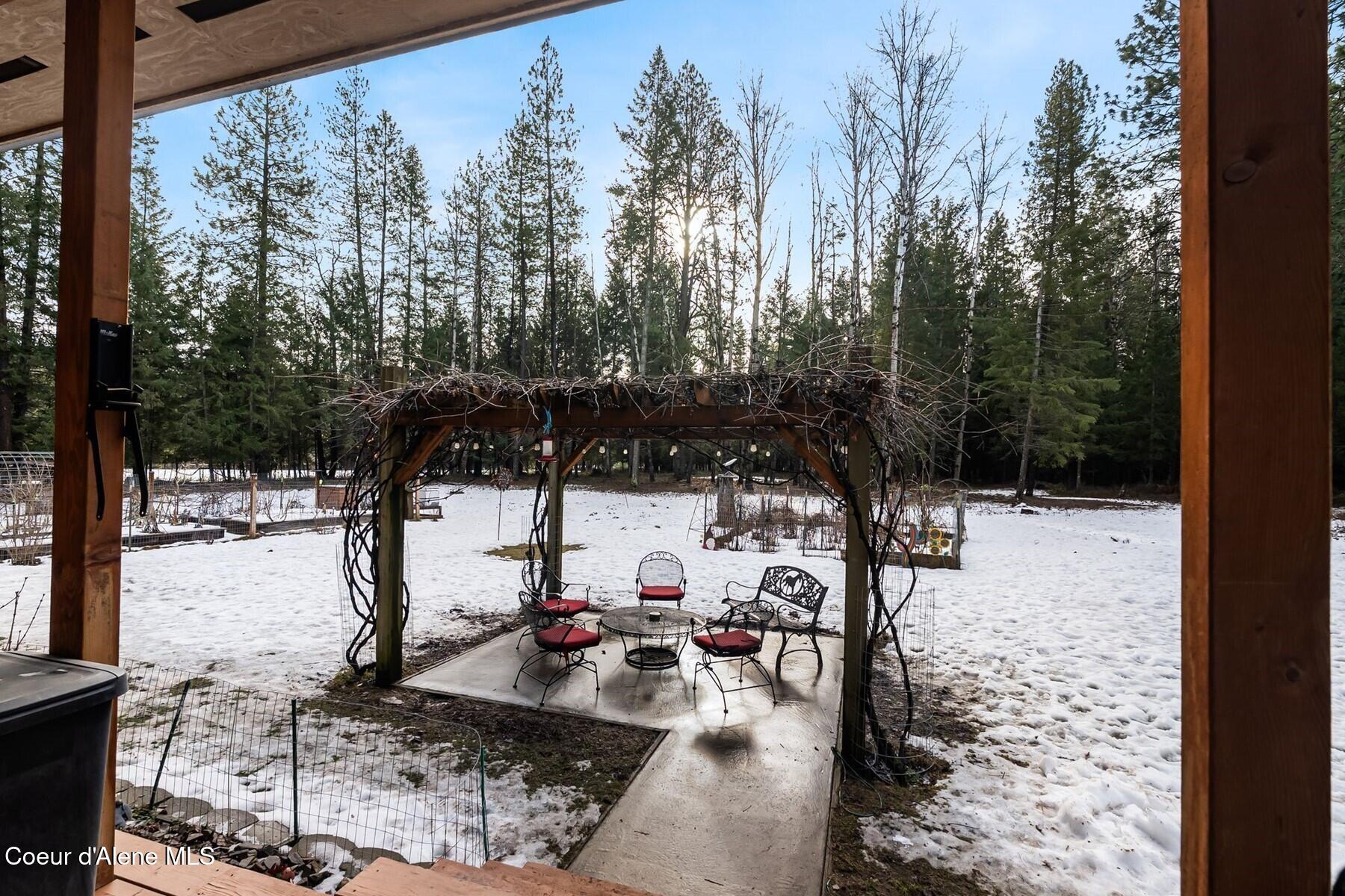 870 Samuels Road Sandpoint, ID 83864 - Photo 17 of 66 Back Deck & Beautiful Patio Area