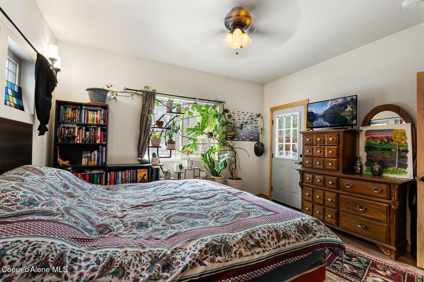 870 Samuels Road Sandpoint, ID 83864 - Photo 23 of 66 Primary Bedroom wDoor to Deck