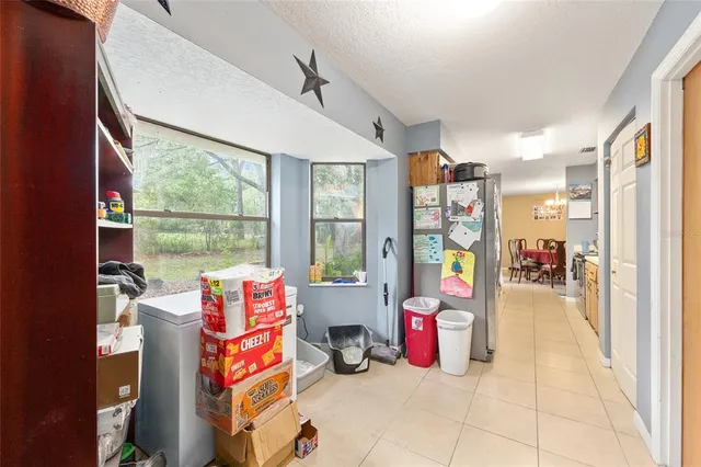 a room with musical instruments and windows