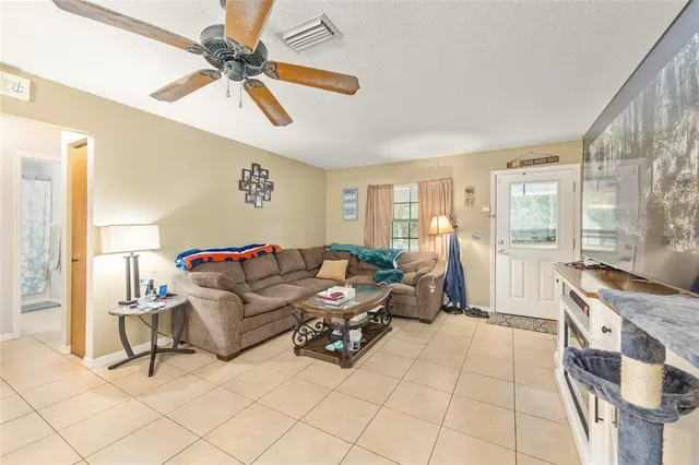 a living room with furniture and a window