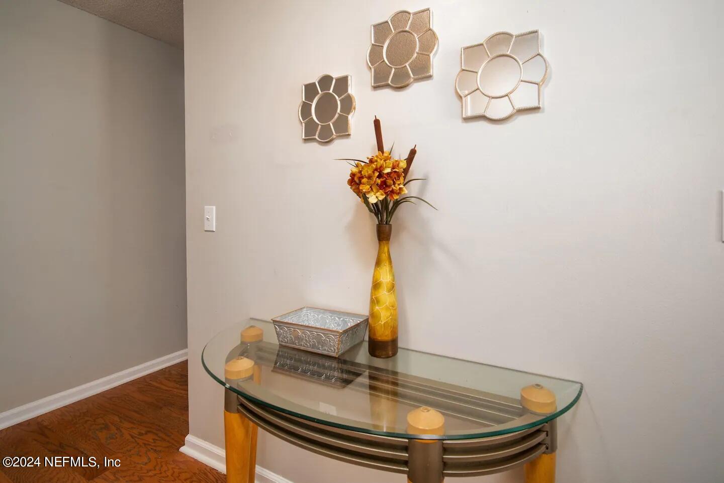 10062 Hawks Hollow Road Jacksonville, FL 32257 - Photo 19 of 39 a view of entryway with wooden floor