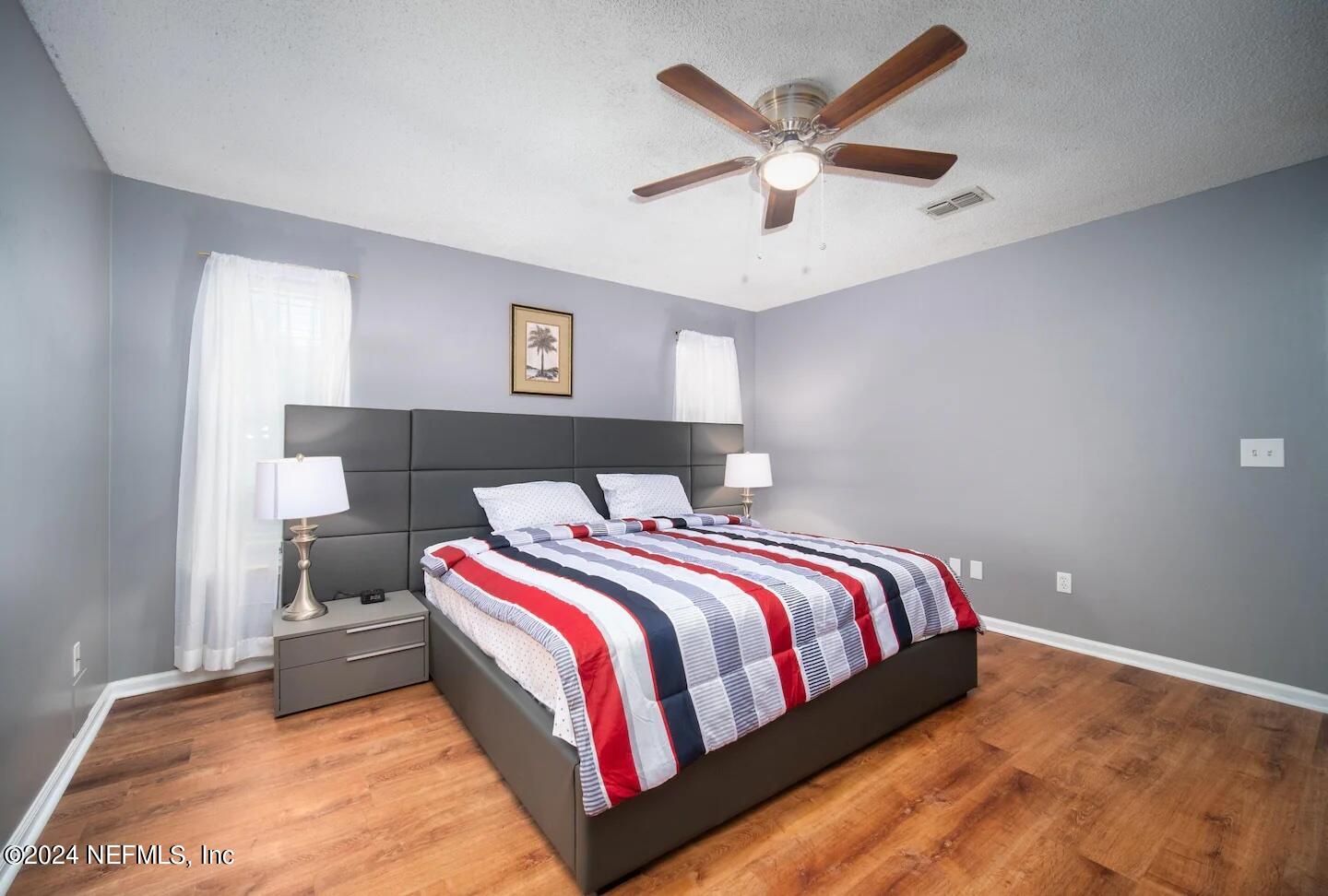 10062 Hawks Hollow Road Jacksonville, FL 32257 - Photo 27 of 39 a bedroom with bed and window