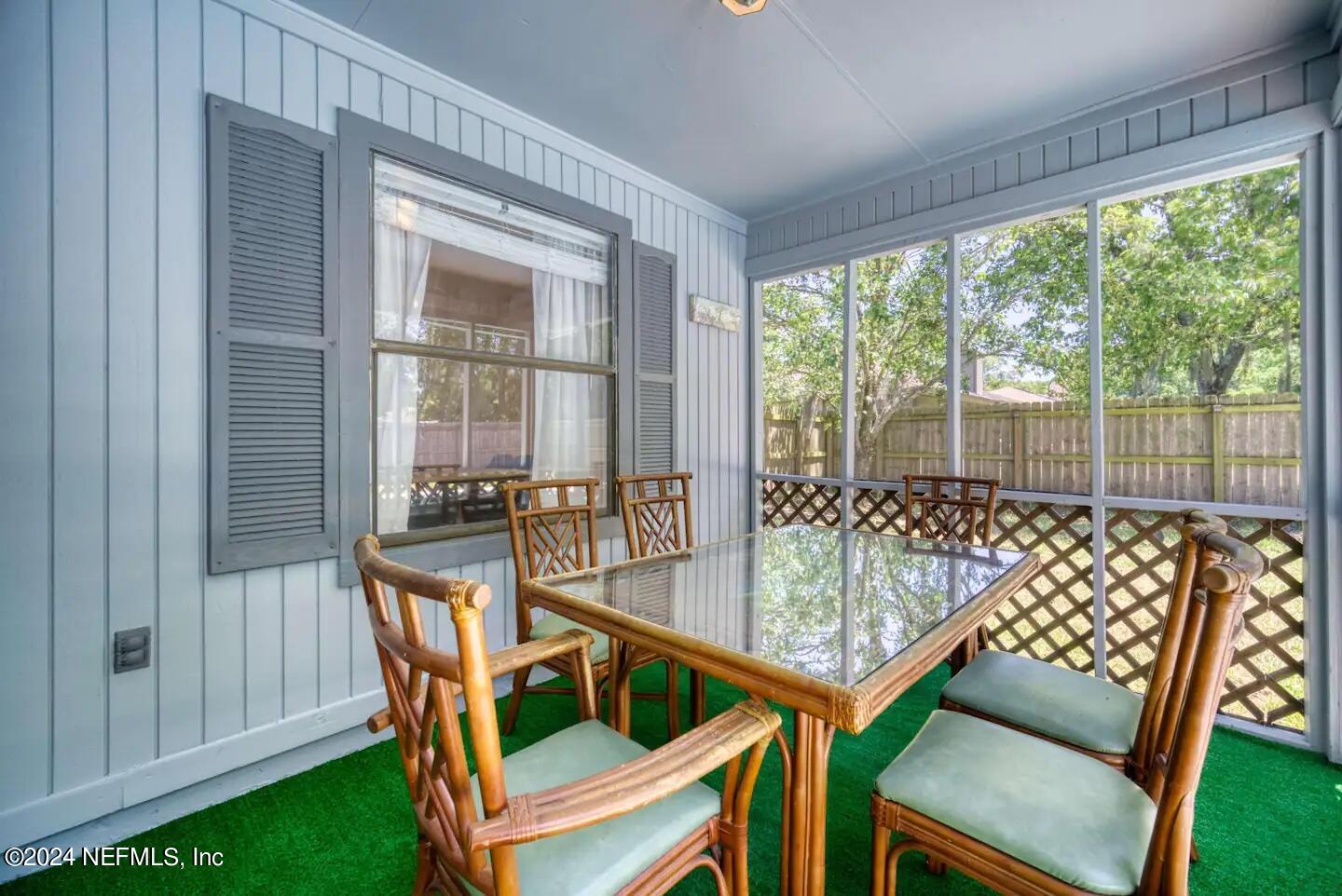 10062 Hawks Hollow Road Jacksonville, FL 32257 - Photo 32 of 39 a view of a dining room with furniture window and outside view
