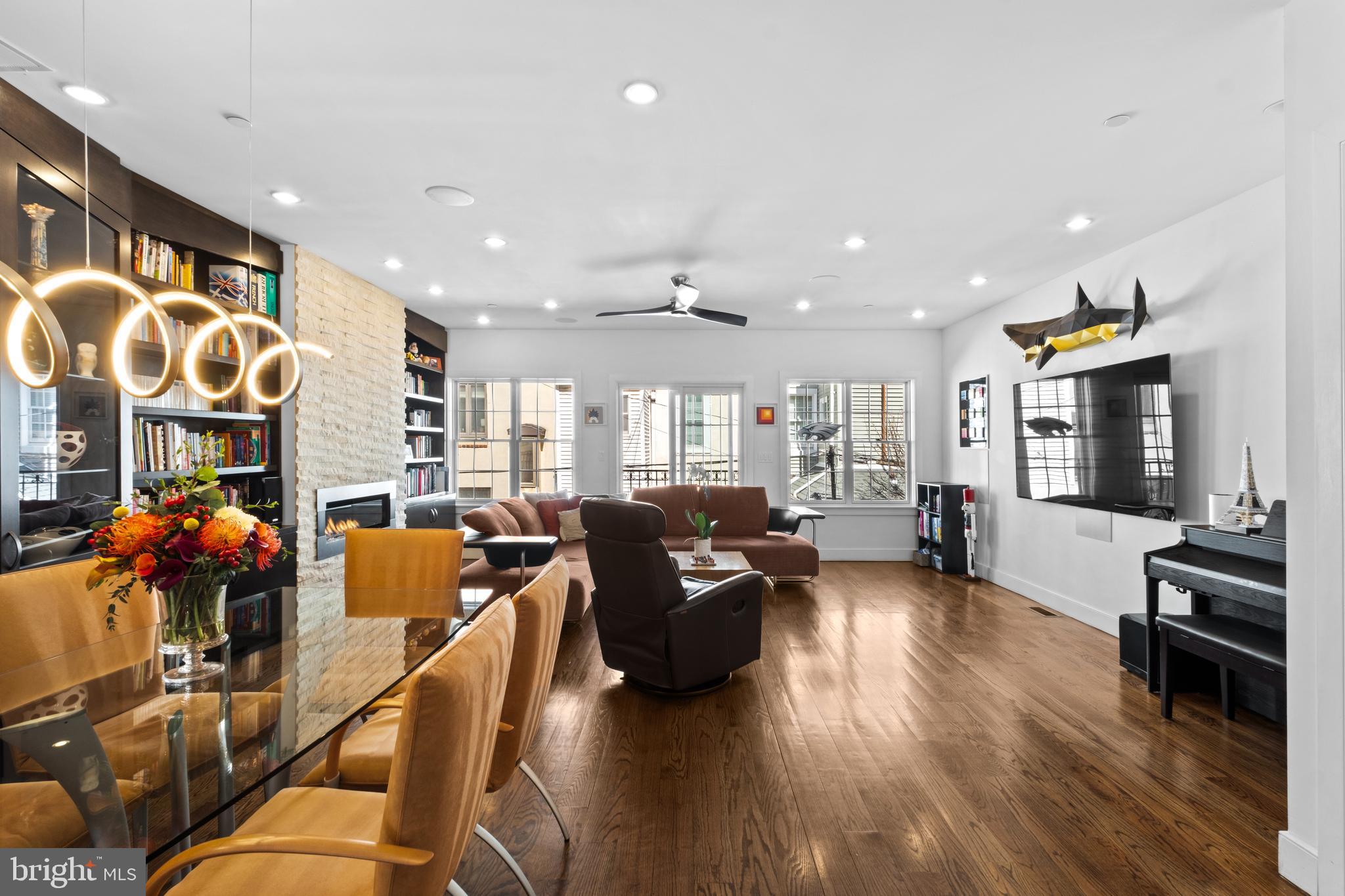1815 Lombard Street Philadelphia, PA 19146 - Photo 11 of 79 a living room with furniture and a fireplace