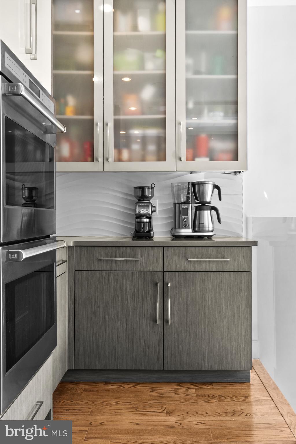 1815 Lombard Street Philadelphia, PA 19146 - Photo 30 of 79 a kitchen with stainless steel appliances white cabinets and a sink
