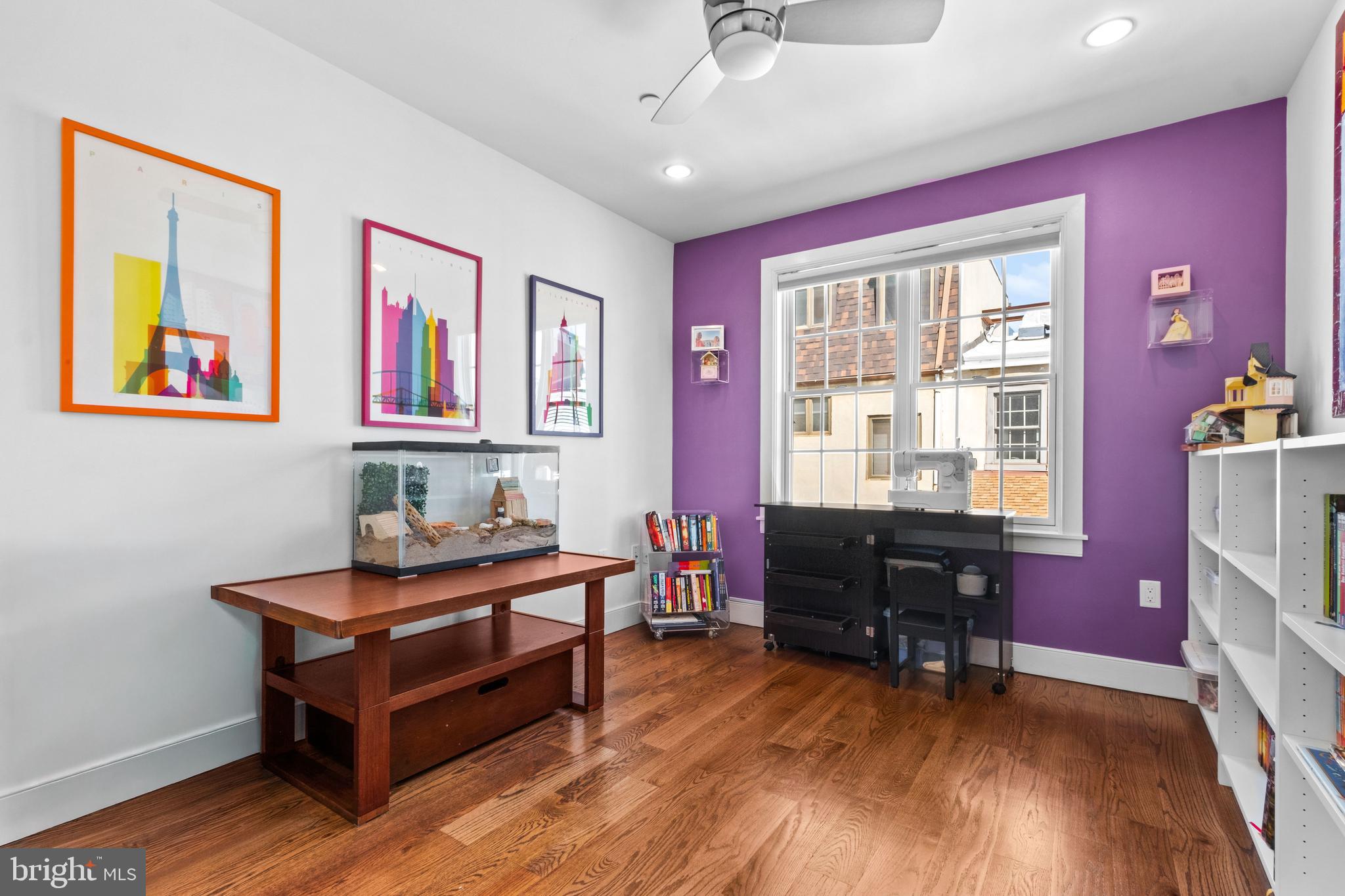 1815 Lombard Street Philadelphia, PA 19146 - Photo 33 of 79 a view of a workspace with furniture window and wooden floor