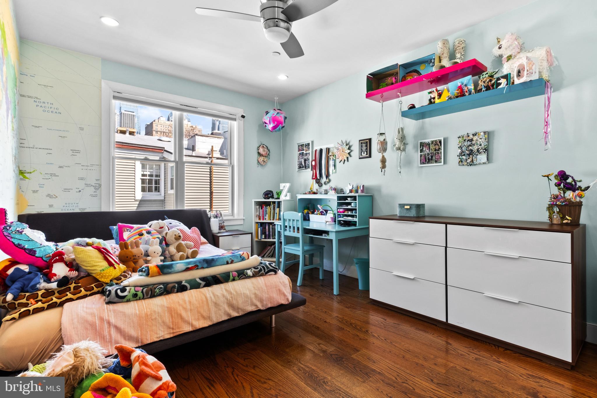 1815 Lombard Street Philadelphia, PA 19146 - Photo 37 of 79 a bedroom with furniture toys and a large window