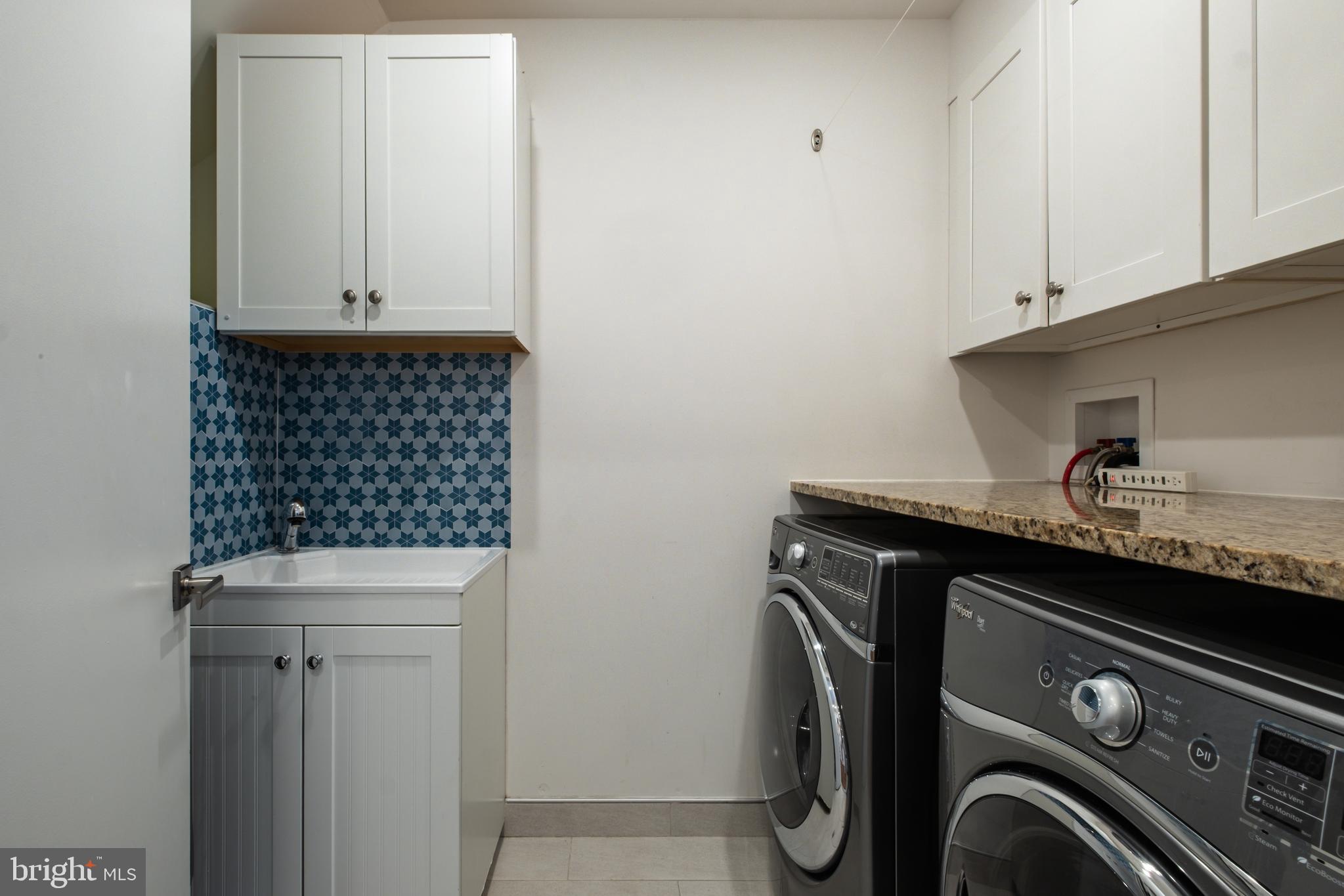 1815 Lombard Street Philadelphia, PA 19146 - Photo 42 of 79 a utility room with dryer and washer