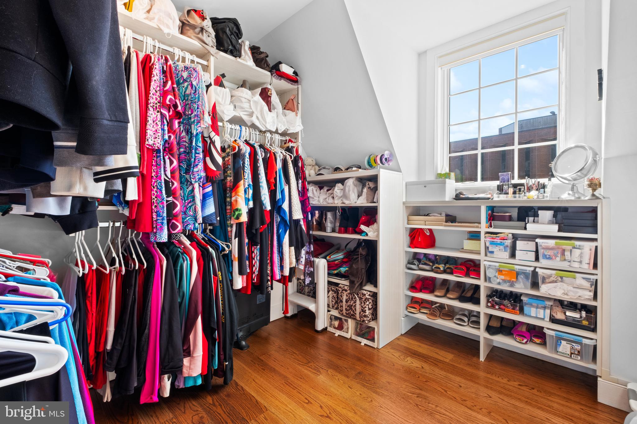 1815 Lombard Street Philadelphia, PA 19146 - Photo 51 of 79 a view of walk in closet with clothes and shoes