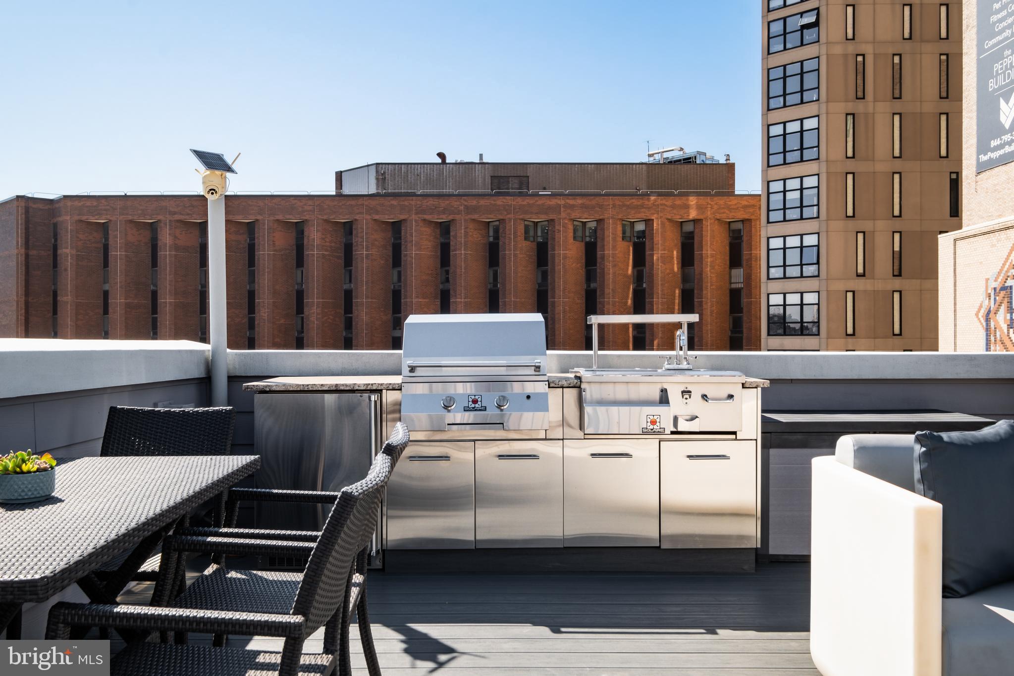 1815 Lombard Street Philadelphia, PA 19146 - Photo 59 of 79 a view of a patio with table and chairs