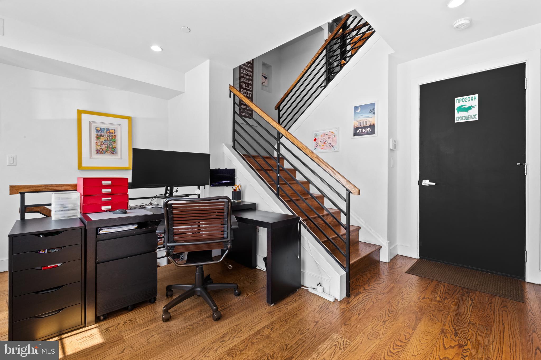 1815 Lombard Street Philadelphia, PA 19146 - Photo 8 of 79 a view of a workspace with furniture and stairs