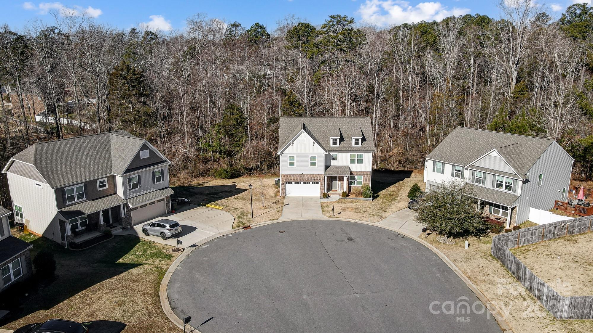 356 Nantucket Way Rock Hill, SC 29732 - Photo 33 of 34 an aerial view of a house with swimming pool and mountains