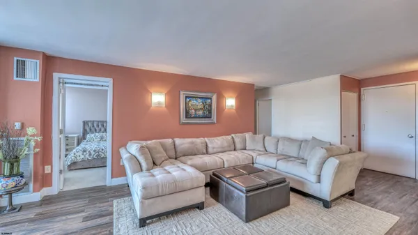 a living room with furniture and a couch