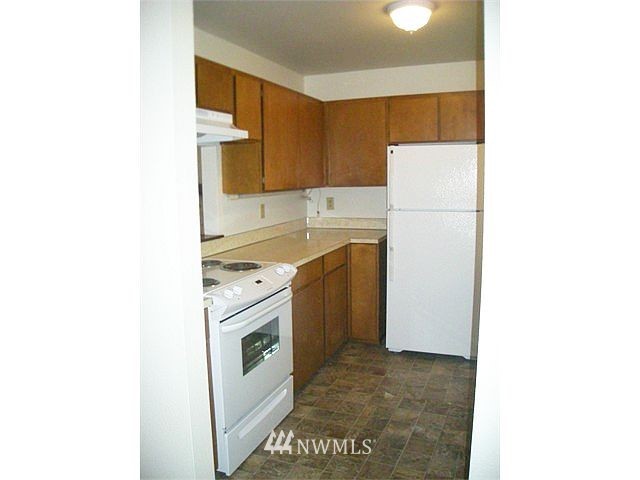 10801 Southeast 170th Street Renton, WA 98055 - Photo 5 of 10 a utility room with dryer and washer
