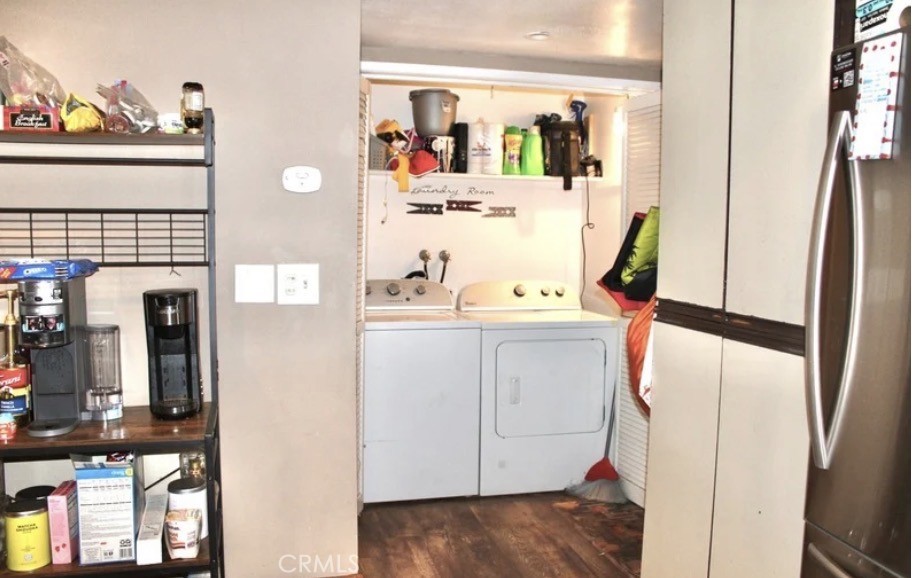25584 Sharp Drive, Unit D Hemet, CA 92544 - Photo 6 of 9 a utility room with dryer and washer