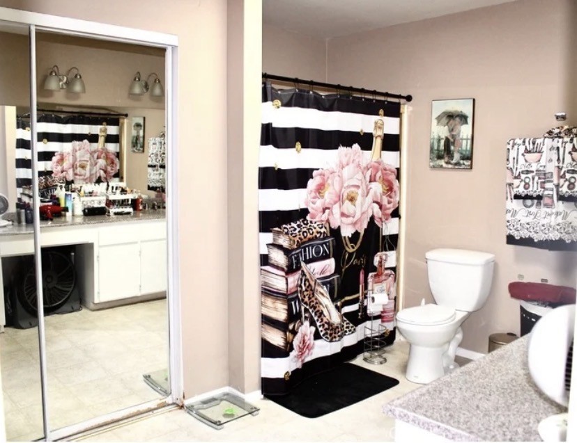 25584 Sharp Drive, Unit D Hemet, CA 92544 - Photo 8 of 9 a bathroom with a sink toilet and shower