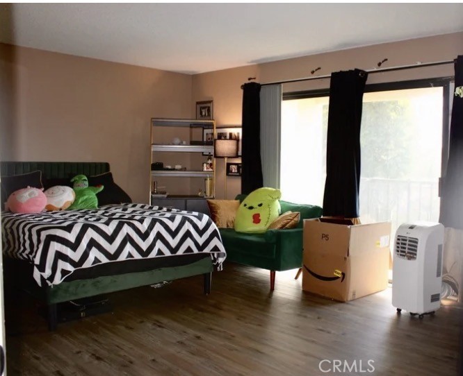 25584 Sharp Drive, Unit D Hemet, CA 92544 - Photo 9 of 9 a bedroom with furniture and a window