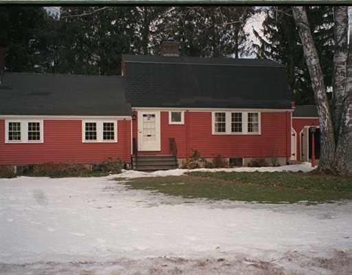 8 Winthrop Road Wayland, MA 01778 - Photo 1 of 1 a front view of a house with a yard