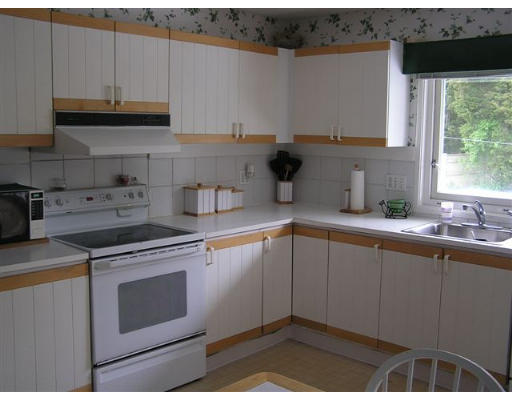 4 Colonel Gridley Road Sharon, MA 02067 - Photo 2 of 8 a kitchen with a sink and cabinets