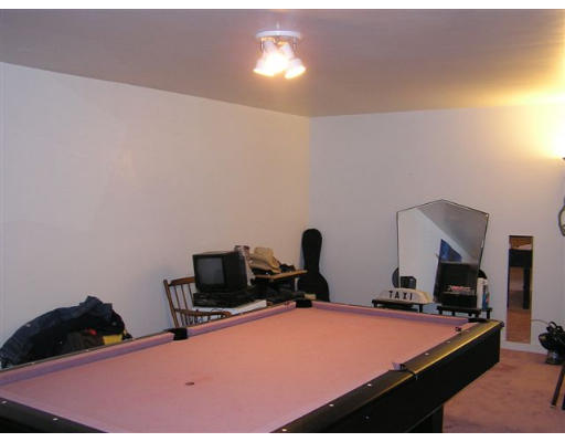 4 Colonel Gridley Road Sharon, MA 02067 - Photo 8 of 8 a room with furniture and flat screen tv