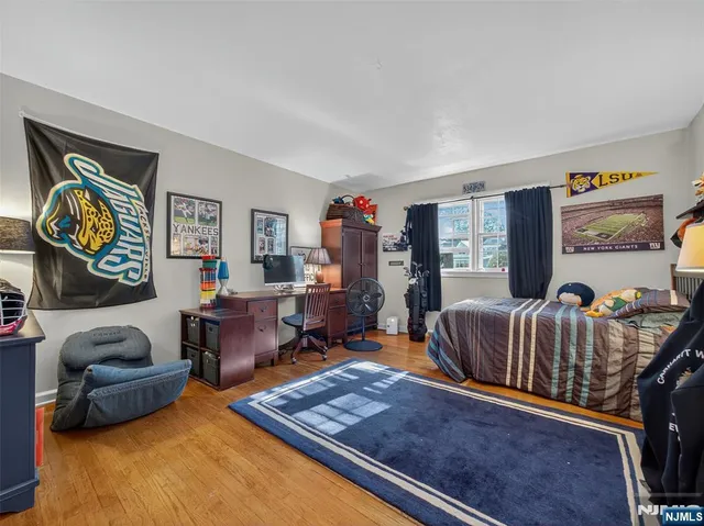 a view of a workspace with furniture and a workspace