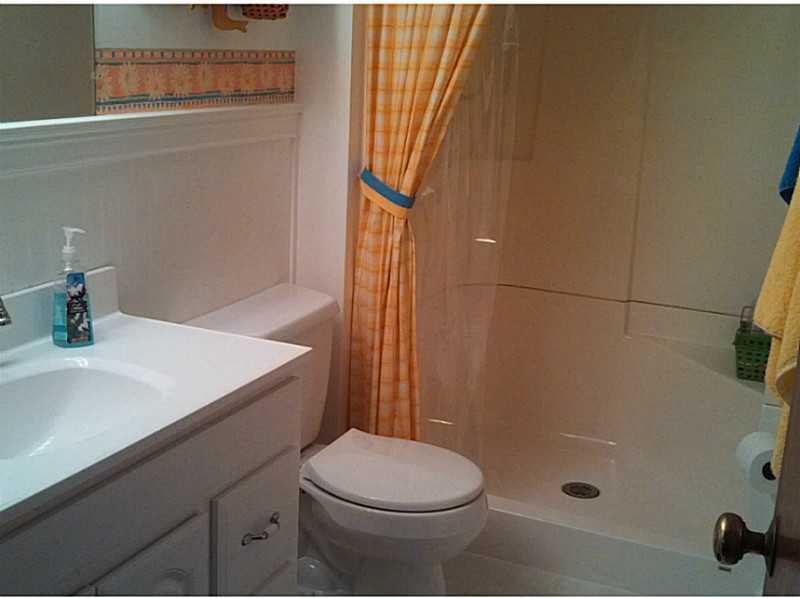 4 Pinkham Street Lincoln, ME 04457 - Photo 22 of 30 Bathroom. Bright bathroom
