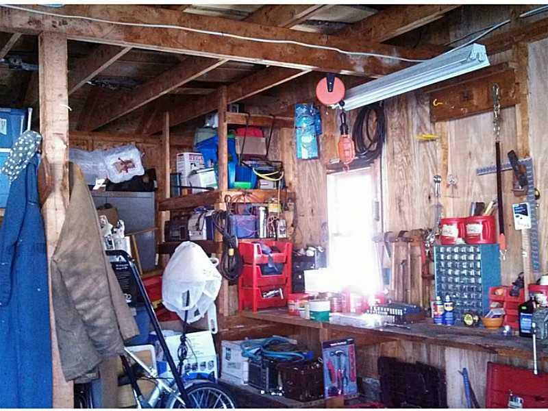 4 Pinkham Street Lincoln, ME 04457 - Photo 28 of 30 Garage. Plenty of room for...