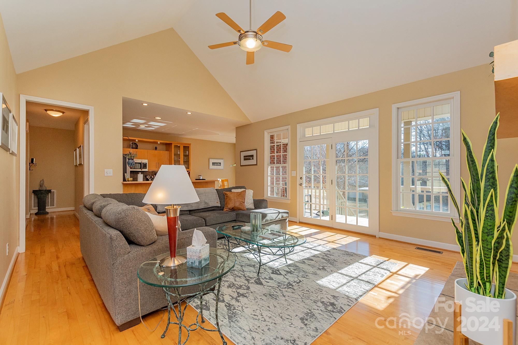3211 Happy Hill Road Lexington, NC 27295 - Photo 11 of 44 a living room with furniture and a large window with garden view