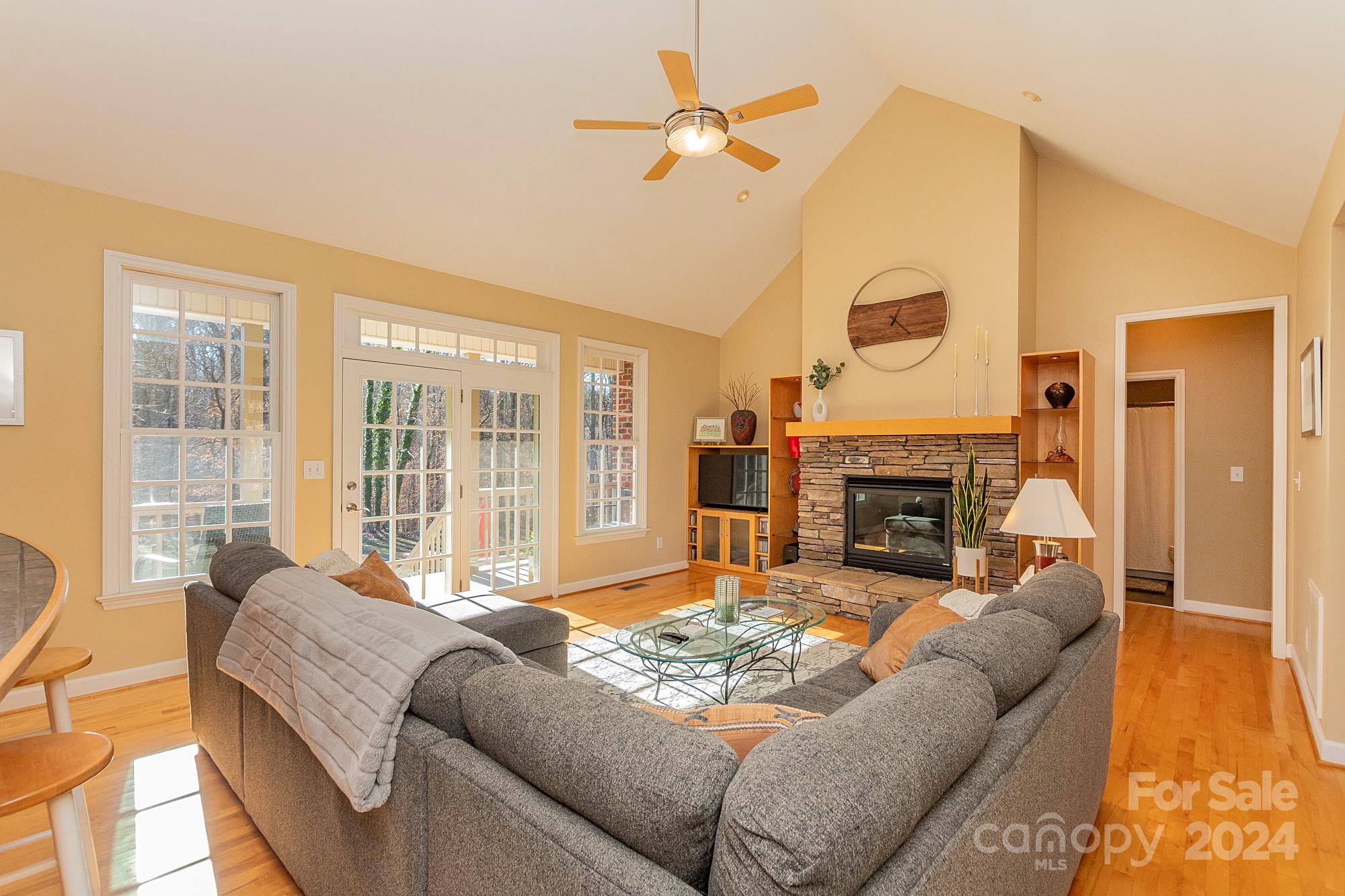 3211 Happy Hill Road Lexington, NC 27295 - Photo 12 of 44 a living room with furniture large window and a fireplace