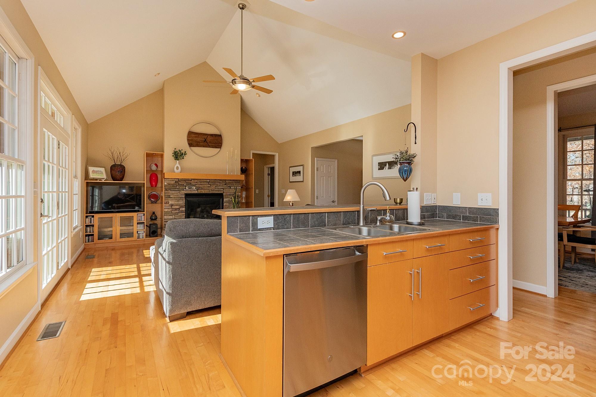 3211 Happy Hill Road Lexington, NC 27295 - Photo 17 of 44 a large kitchen with stainless steel appliances granite countertop a sink a stove and a refrigerator