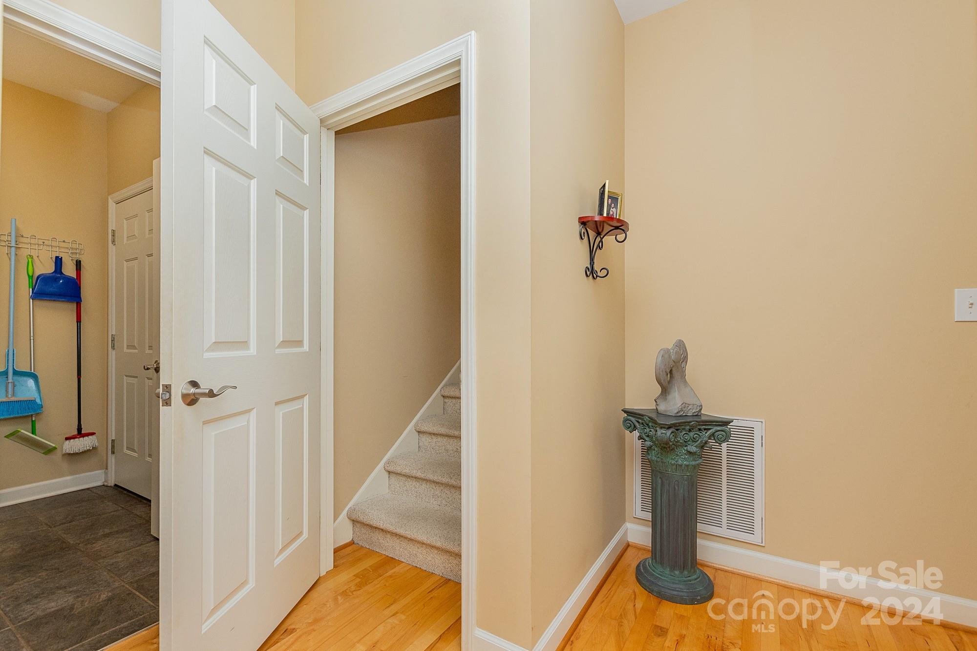 3211 Happy Hill Road Lexington, NC 27295 - Photo 20 of 44 a view of a livingroom with wooden floor and staircase