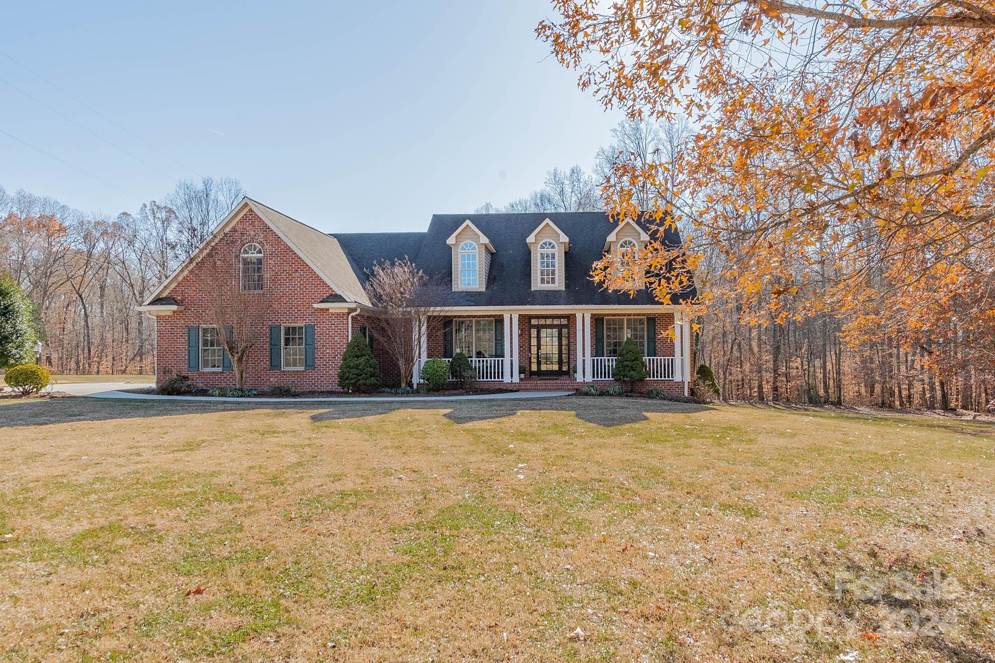 3211 Happy Hill Road Lexington, NC 27295 - Photo 2 of 44 a front view of house with yard covered in snow