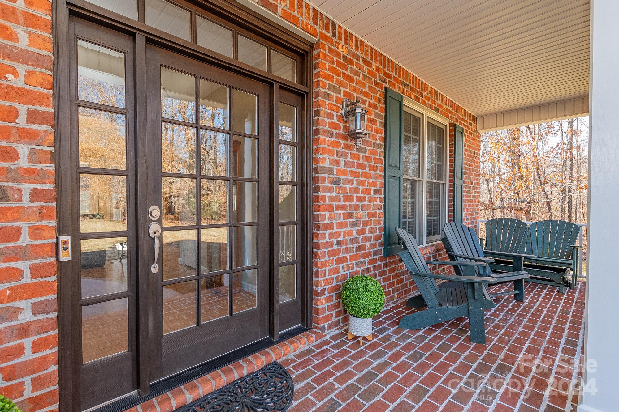 3211 Happy Hill Road Lexington, NC 27295 - Photo 7 of 44 a view of a balcony with chair and table
