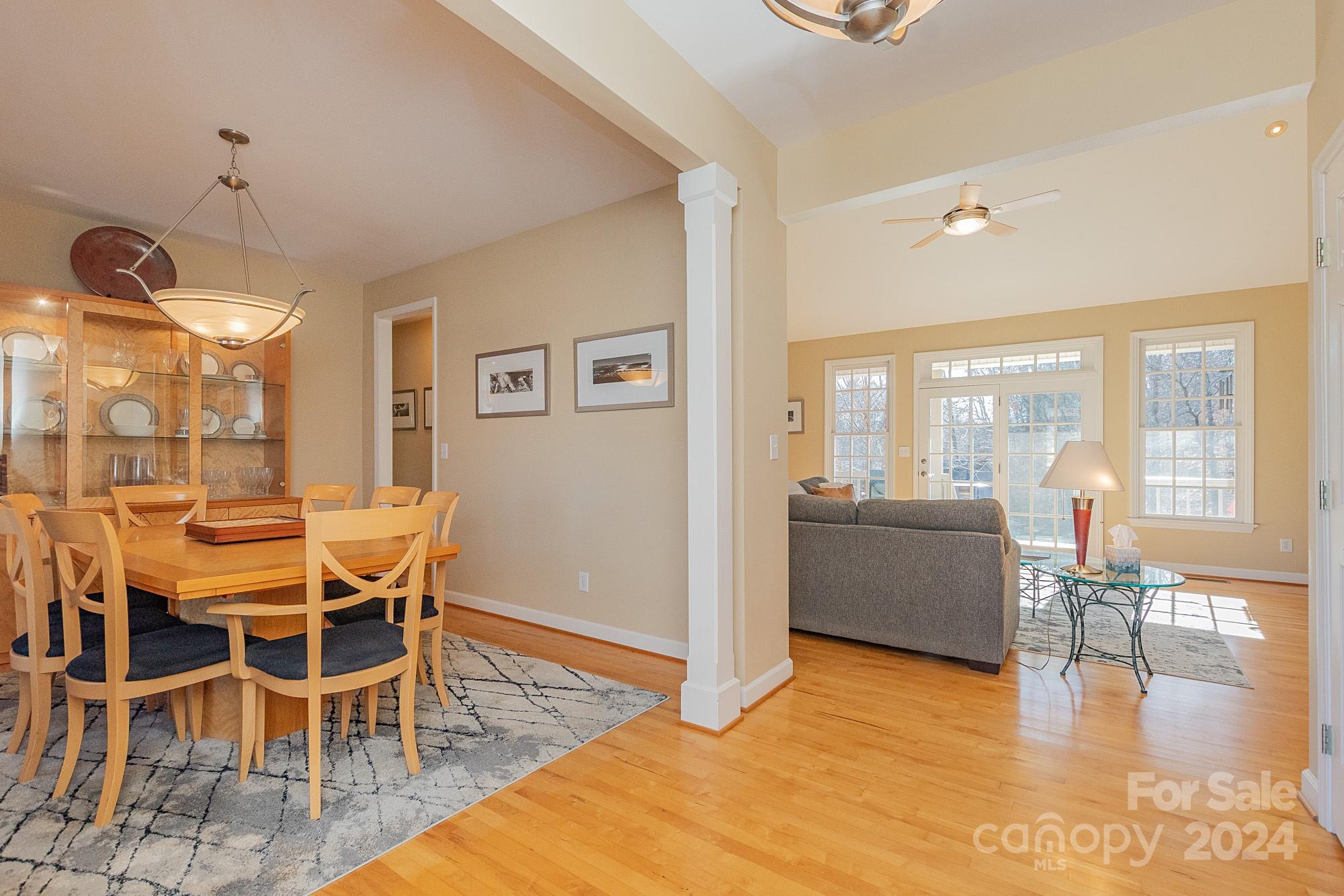 3211 Happy Hill Road Lexington, NC 27295 - Photo 8 of 44 a view of a dining room with furniture wooden floor and chandelier