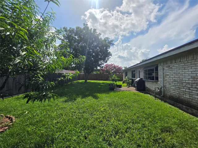 a view of a porch with a yard