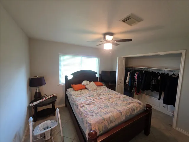 a bed room with a bed and a view