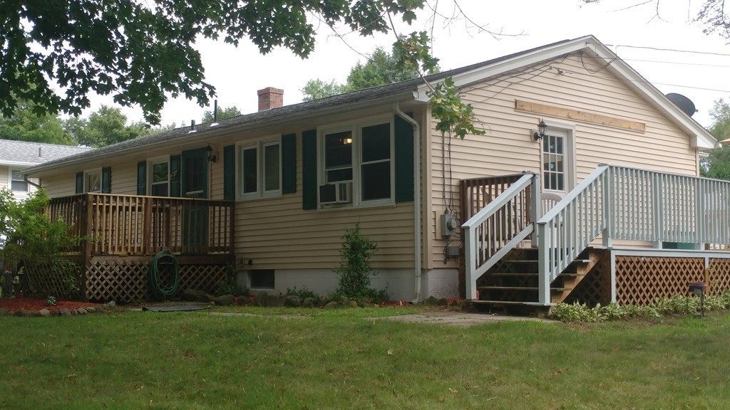 185 Chudy Street Three Rivers, MA 01080 - Photo 1 of 16 a view of a house with a yard