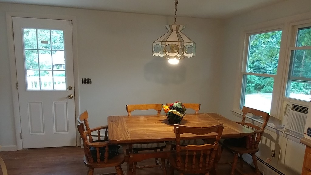 185 Chudy Street Three Rivers, MA 01080 - Photo 11 of 16 a view of a dining room with furniture window and outside view