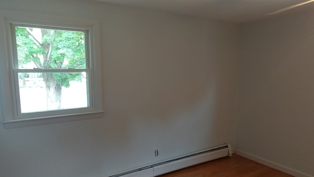 185 Chudy Street Three Rivers, MA 01080 - Photo 13 of 16 an empty room with a window