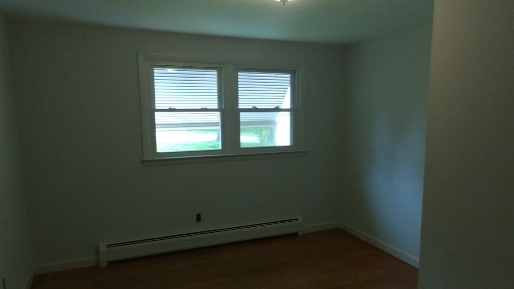 185 Chudy Street Three Rivers, MA 01080 - Photo 14 of 16 an empty room with a window