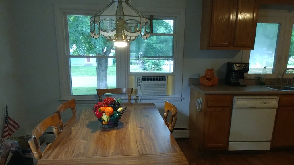 185 Chudy Street Three Rivers, MA 01080 - Photo 9 of 16 a kitchen with stainless steel appliances wooden cabinets a stove top oven and sink