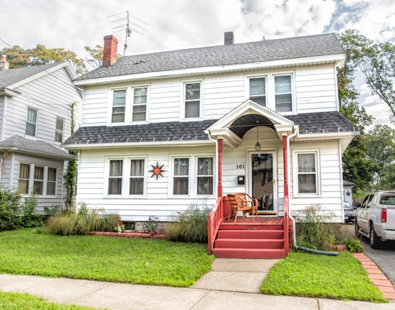 101 Daviston Street Springfield, MA 01108 - Photo 1 of 25 a front view of a house with a yard