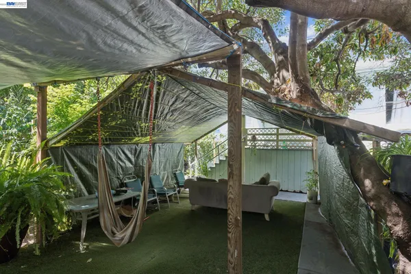 a view of a pathway with a patio