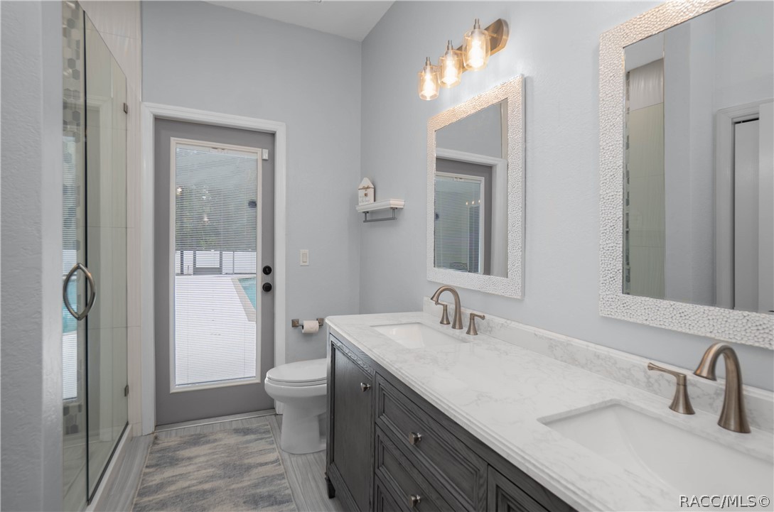 1 Stokesia Court South Homosassa, FL 34446 - Photo 29 of 50 Guest Full size bathroom with pool access