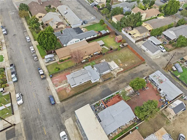 an aerial view of a house with a garden