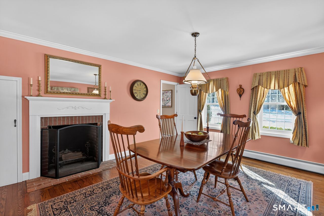 4 Hunters Ridge Road Killingworth, CT 06419 - Photo 11 of 40 a dining room with furniture window and wooden floor