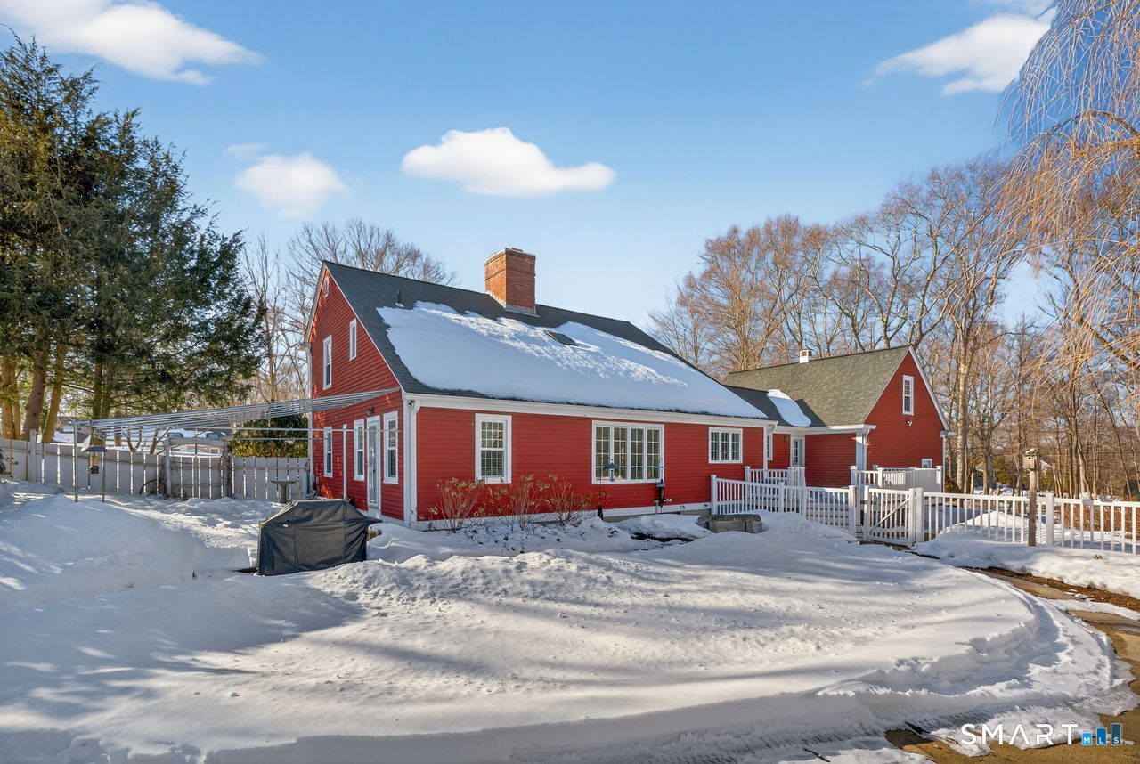 4 Hunters Ridge Road Killingworth, CT 06419 - Photo 3 of 40 a front view of a house with a yard